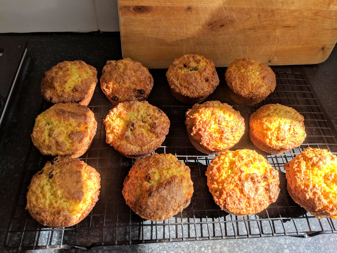 Orange muffins on a cooling rack